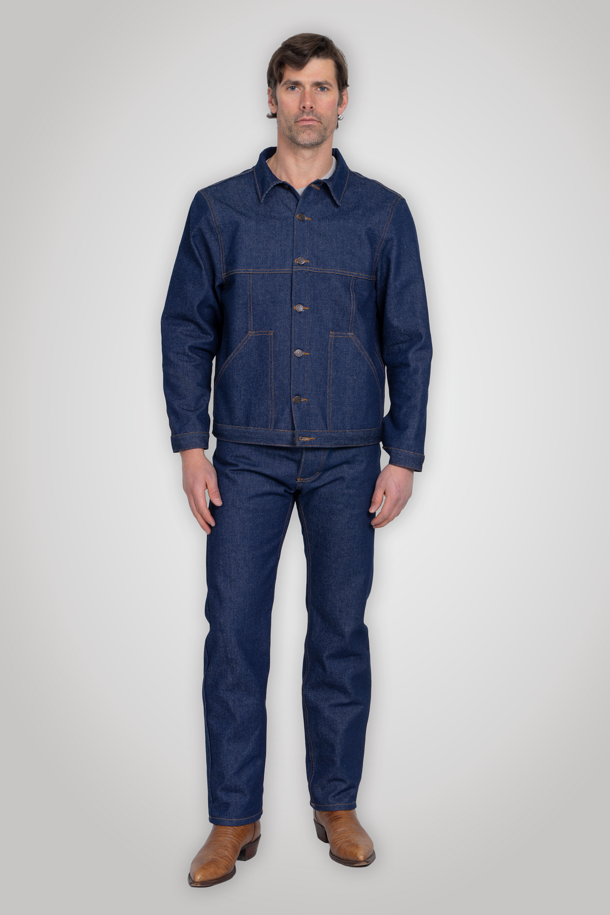 Detail of the 14oz cotton denim fabric and contrast thread stitching.