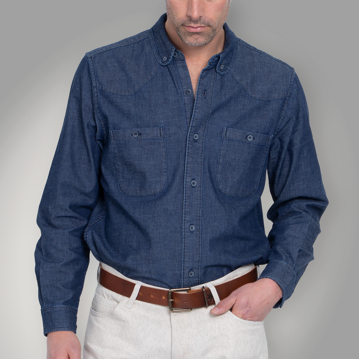 Back of the indigo button down showing the center box pleat
