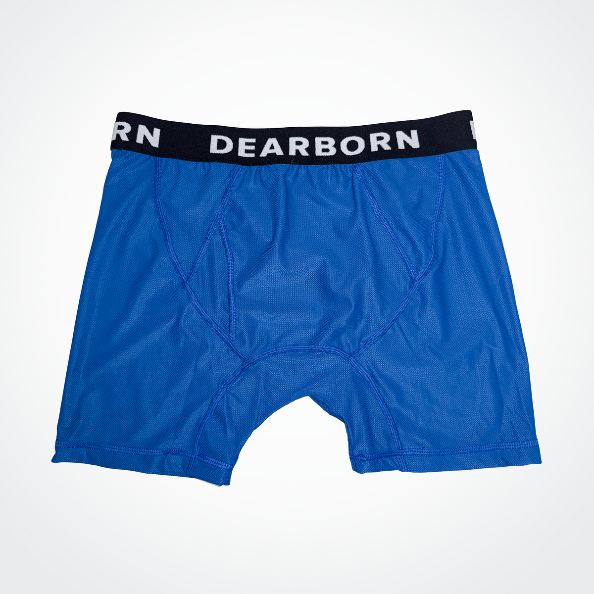 Close-up of the extra-thick jacquard knit waistband and mesh fabric texture.