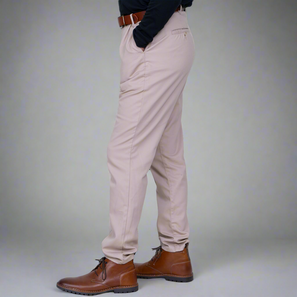 Back view of khaki high rise chinos showing welt pockets with button closures.