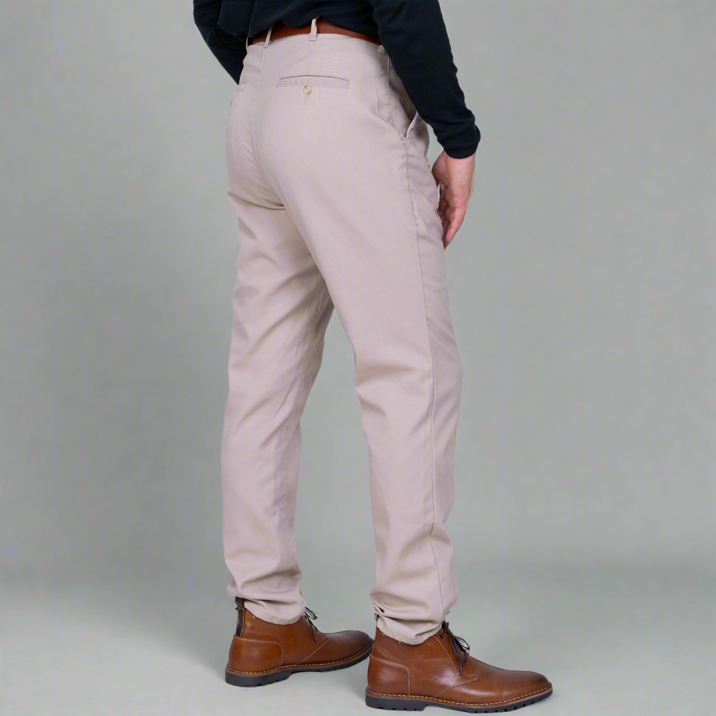 Side view of khaki stretch twill chinos showing the medium rise and tapered leg.