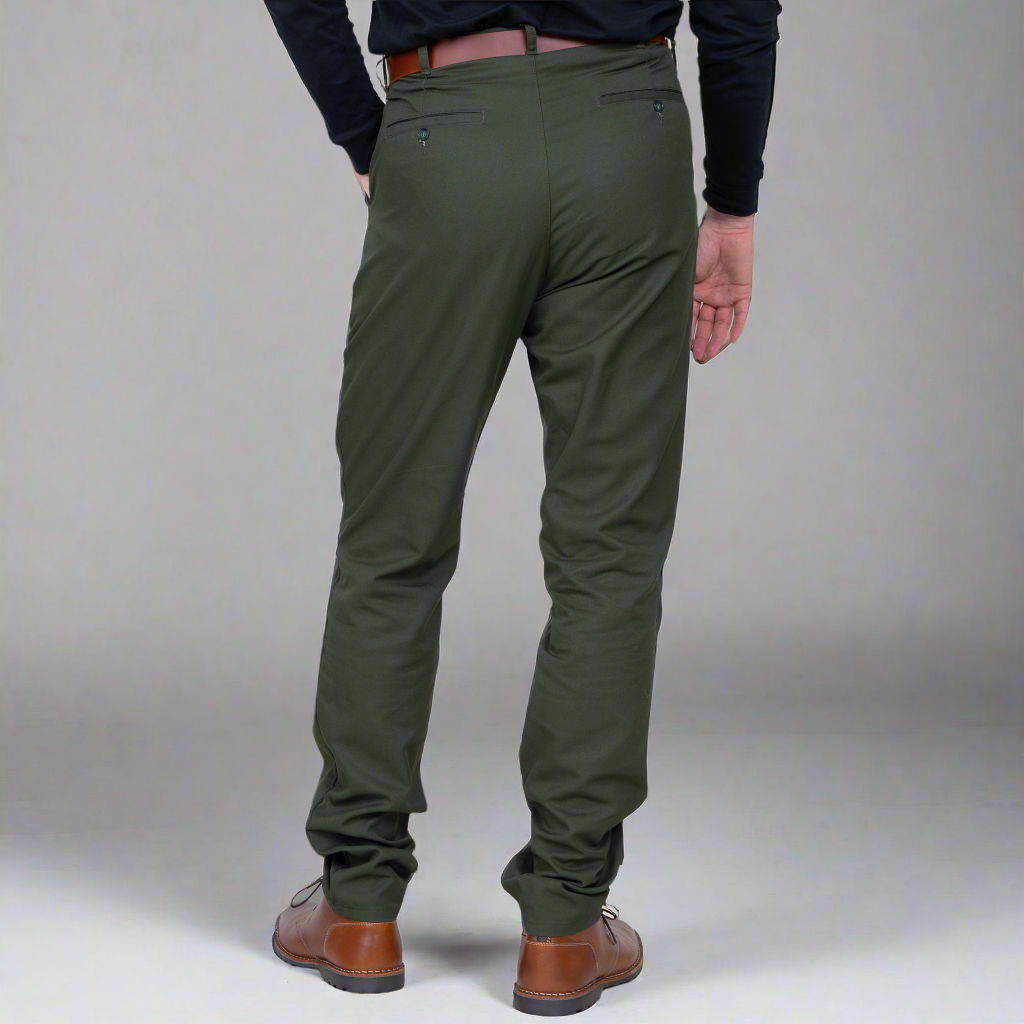 Detail of the welt pocket with button closure on the olive chino