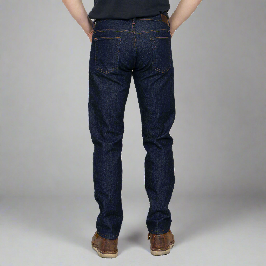 Tapered lower leg of Tailored Fit jeans showing 14.5 inch leg opening and hem