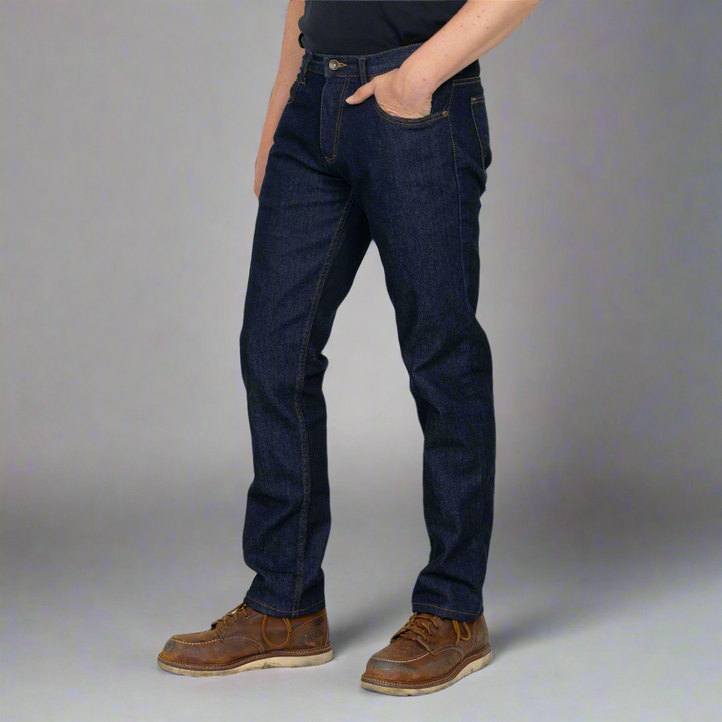 Back view of dark wash Tailored Fit jeans showing back pockets and Horween leather patch