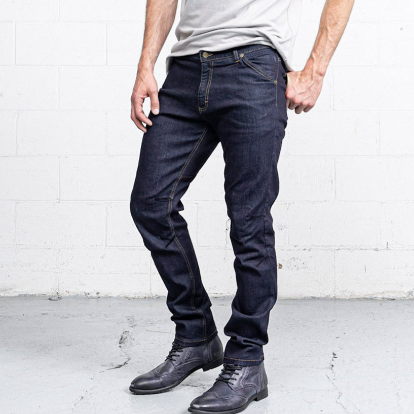 Commuter jeans in a dark indigo rinse wash, shown front on with slim legs below the knee.