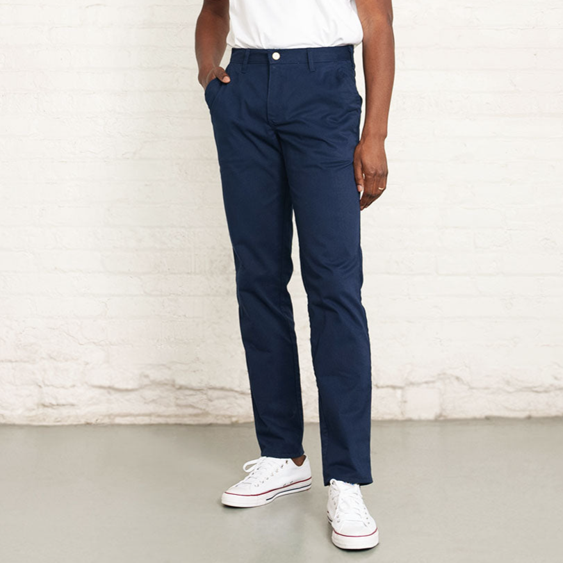 Navy stretch chino pants in tailored fit, shown flat from the front.