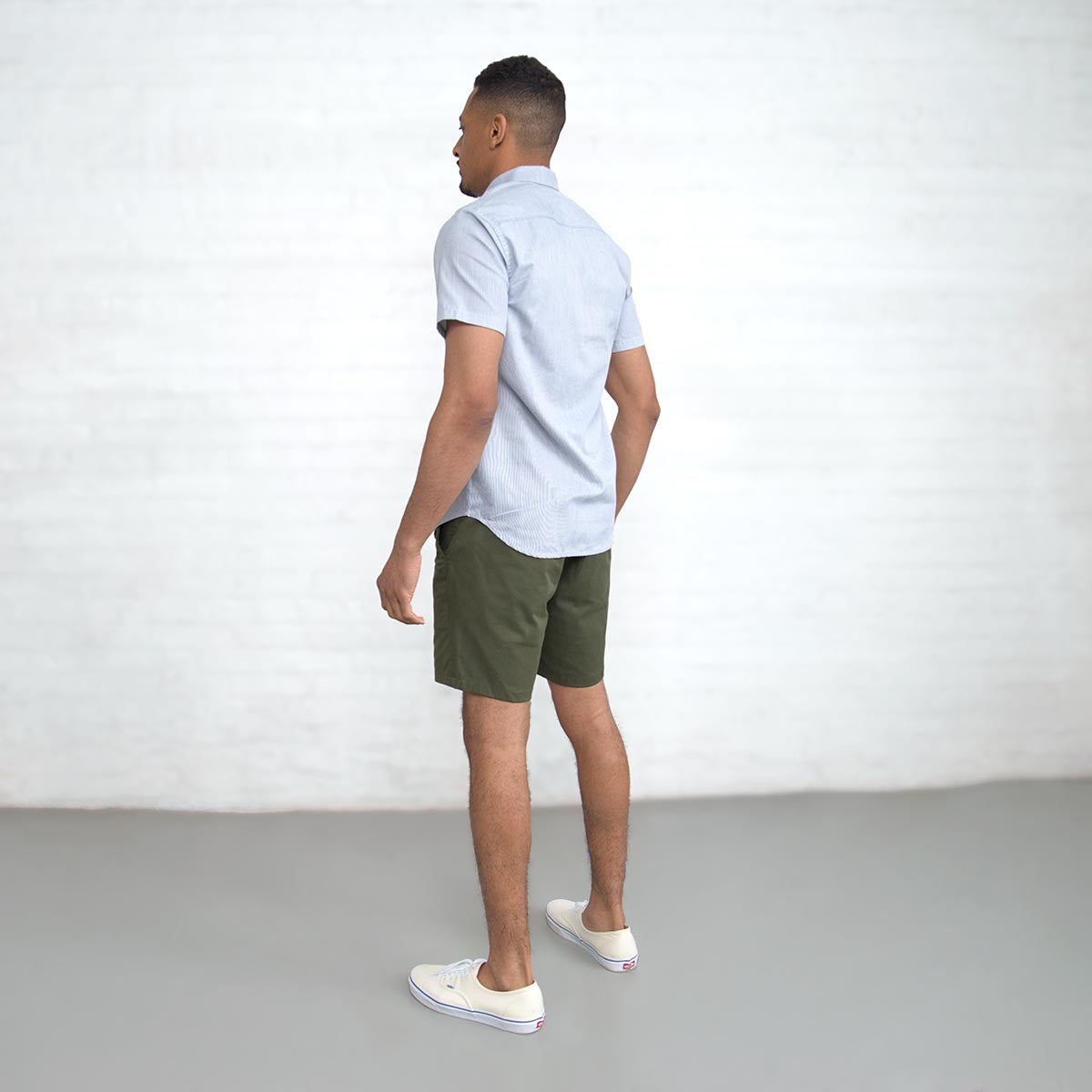 Close-up of the brushed 8.5oz stretch twill fabric in olive.