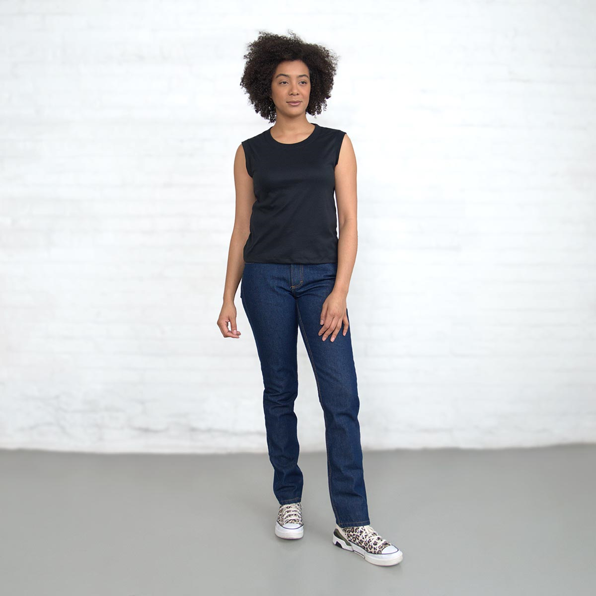 Black sleeveless crop top in Supima cotton, front view
