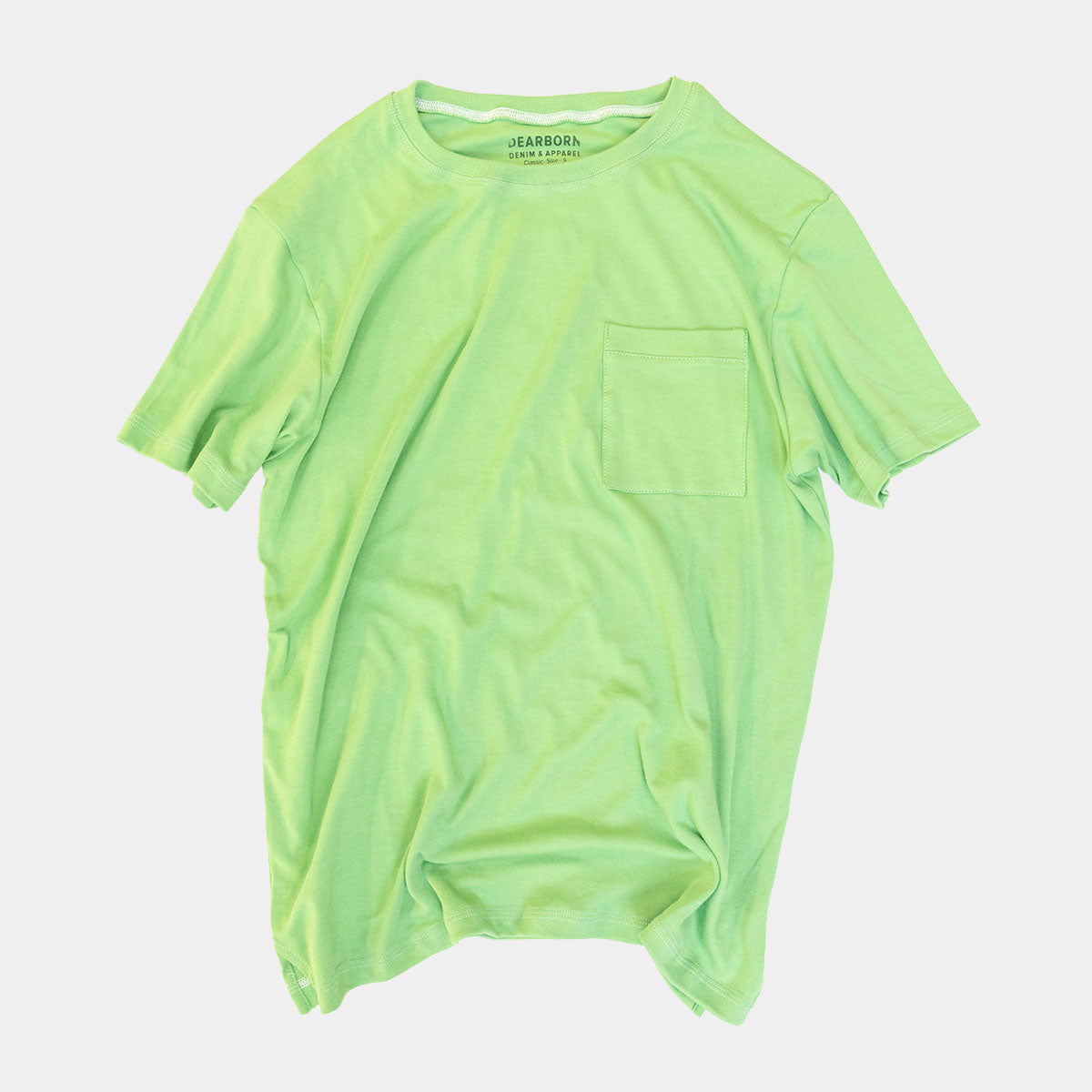 Jade Supima pocket T-shirt worn with jeans, front view.