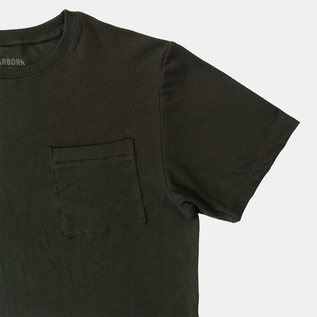 Back view of the black Supima cotton T-shirt showing plain back and short sleeves.