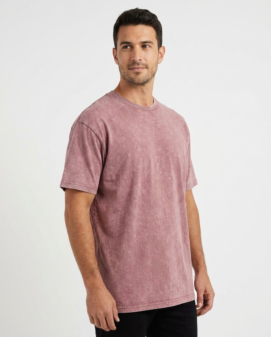 Close-up of the triple stitched collar on the fig t-shirt.