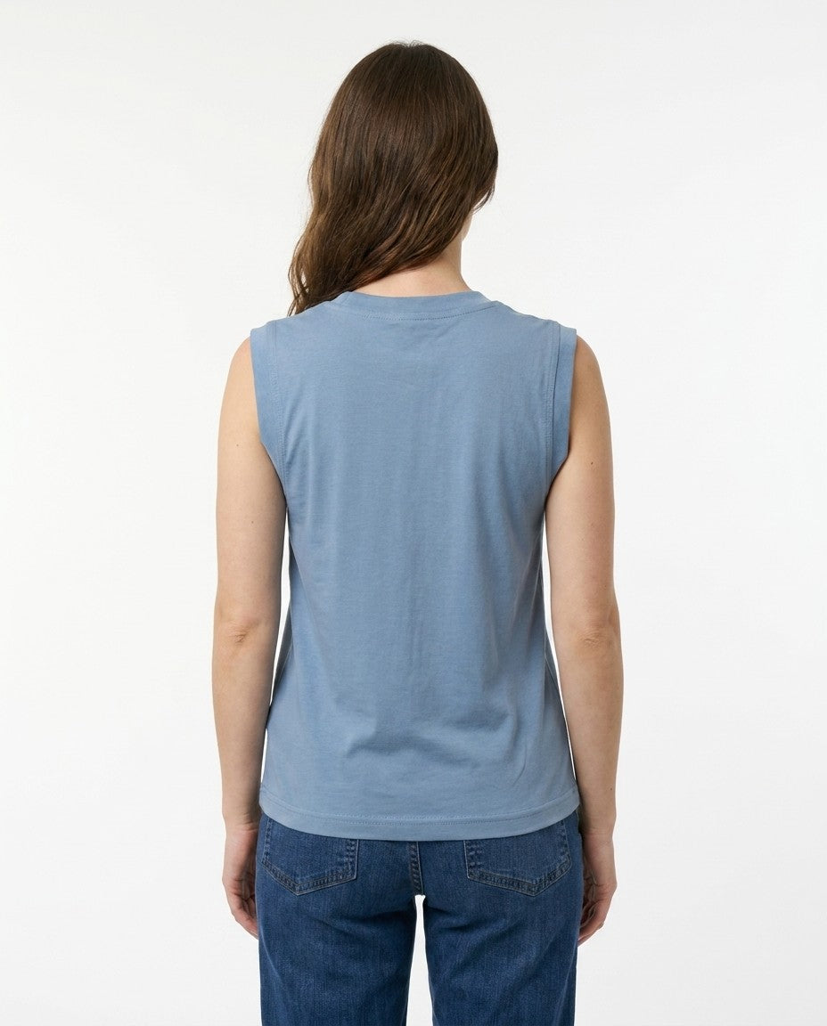 Close-up of the blue 8oz cotton jersey knit at the collar and shoulder edge.