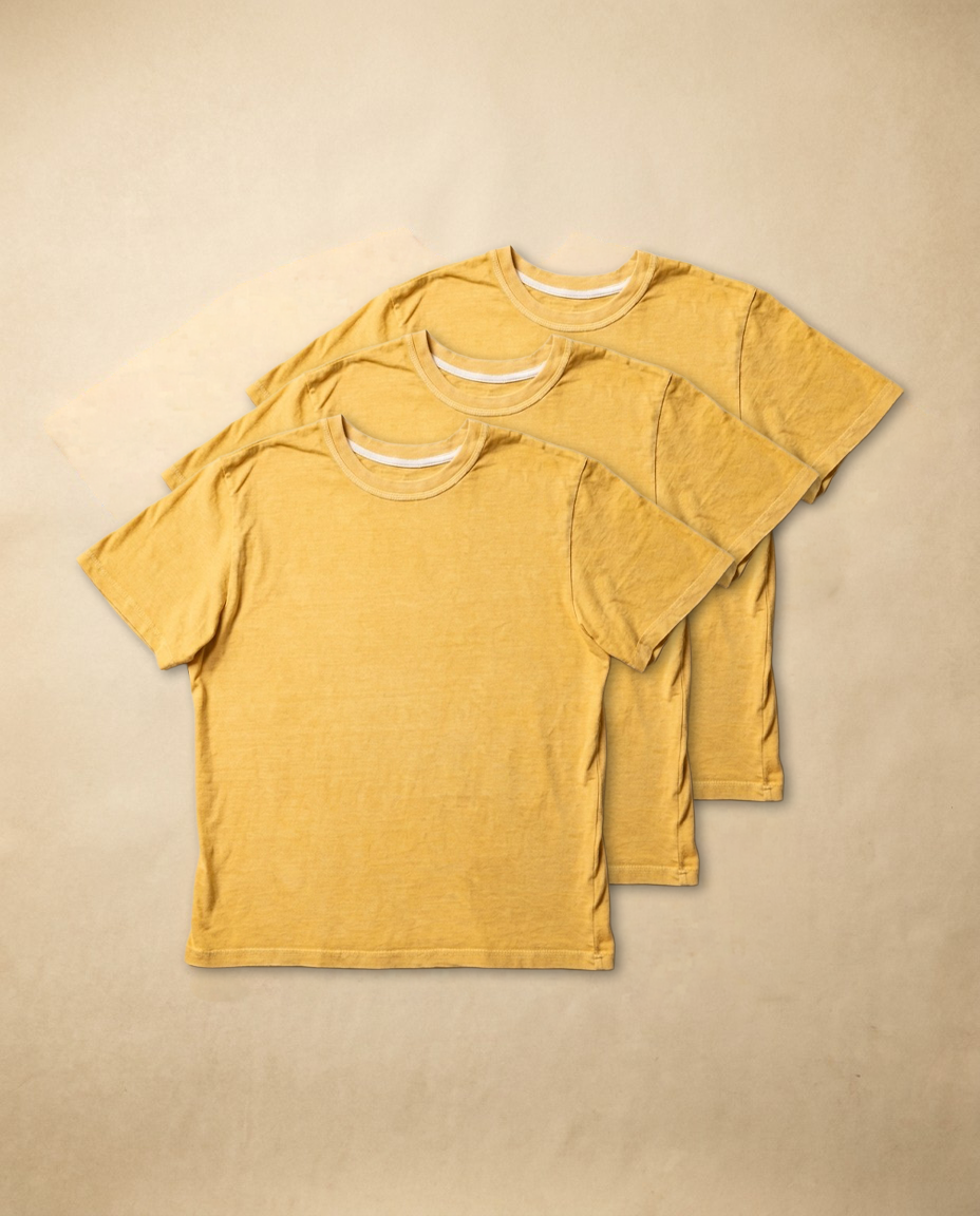 Sunflower yellow combed cotton t-shirt laid flat, front view with crew collar and mid bicep sleeves.