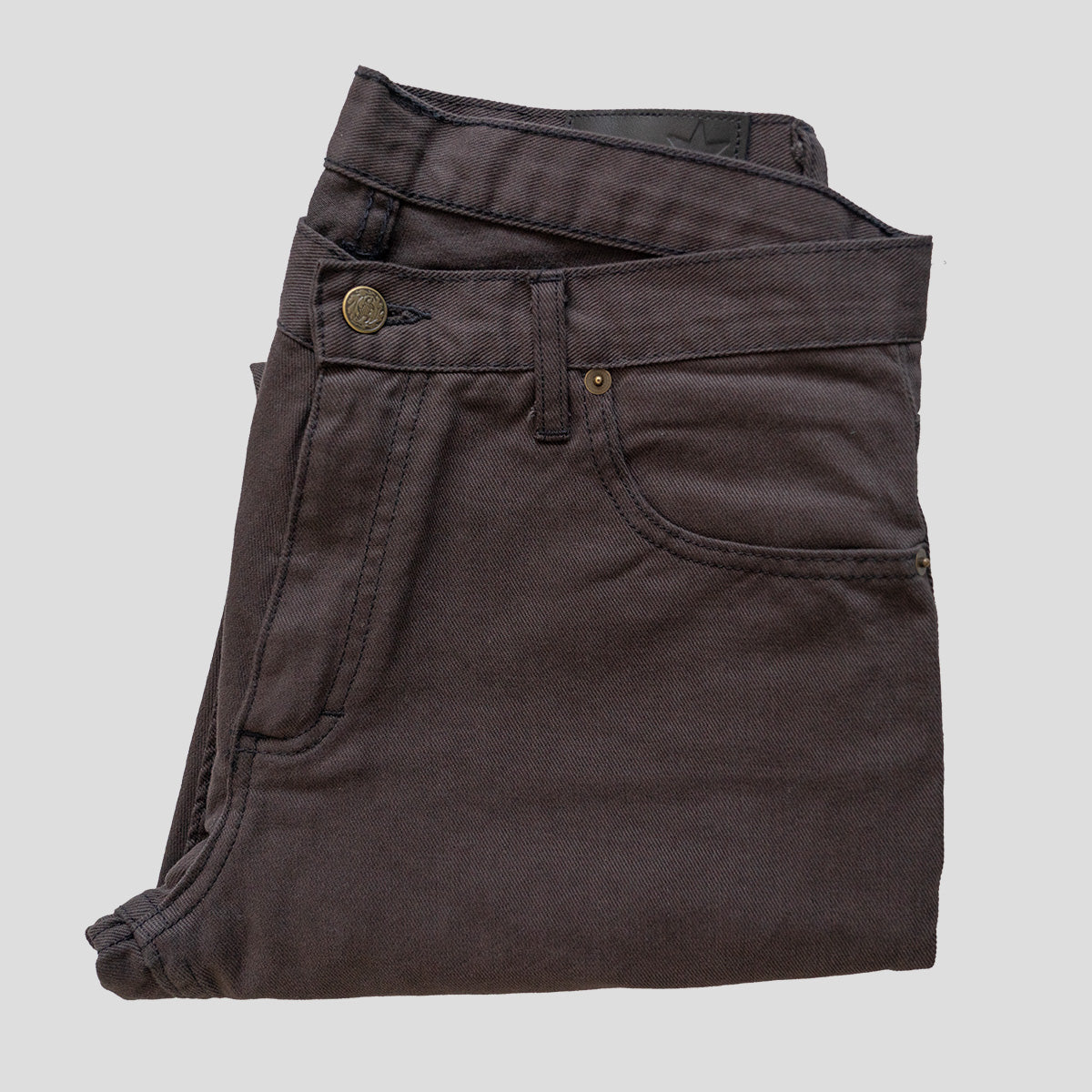 Espresso Tailored Fit jeans folded to show the color and denim surface.