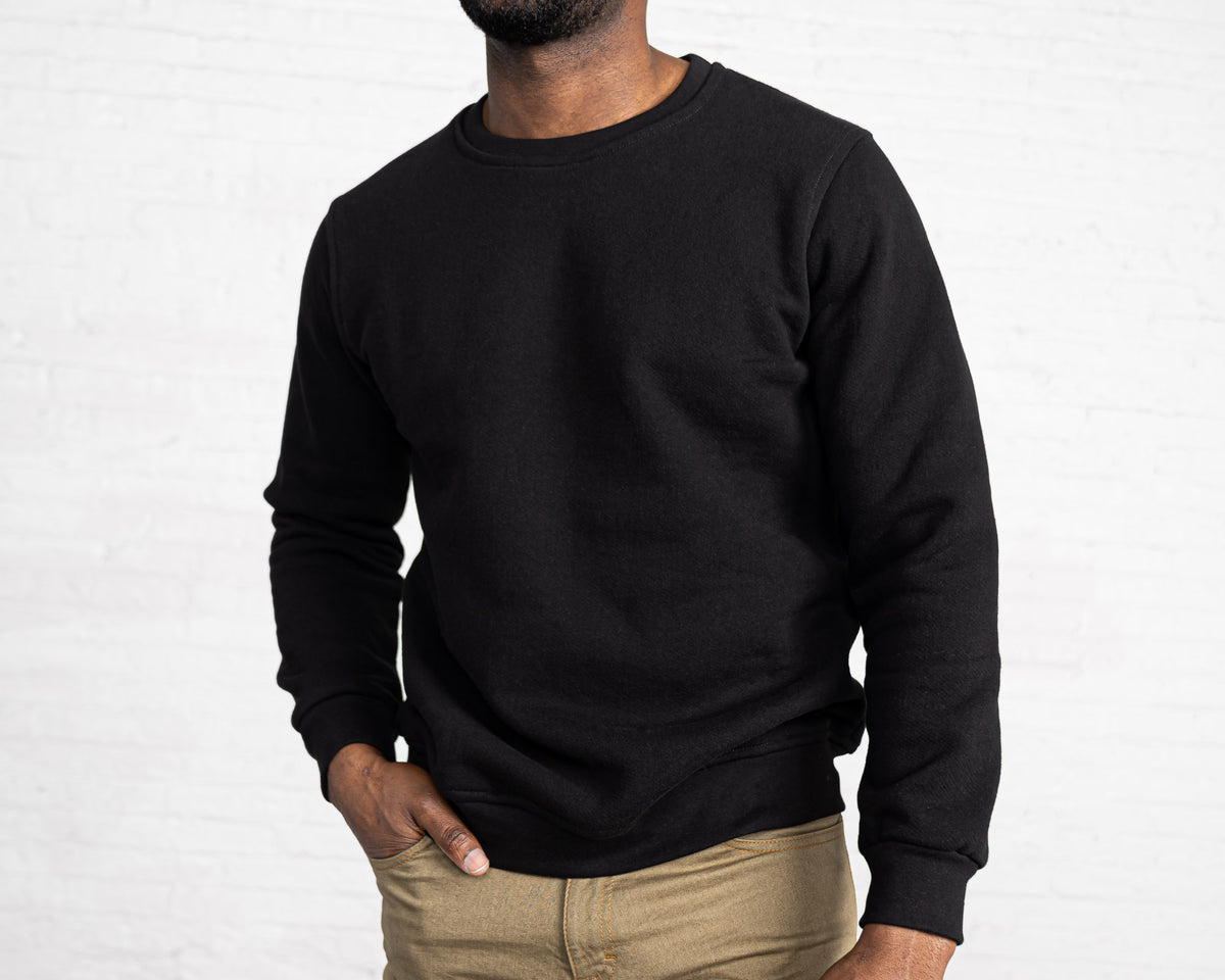 Back view of the black cotton fleece collegiate sweatshirt