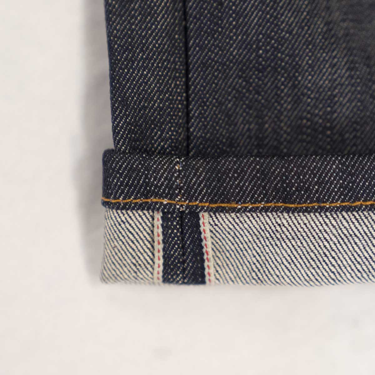 Close-up of the 11oz raw indigo denim weave.