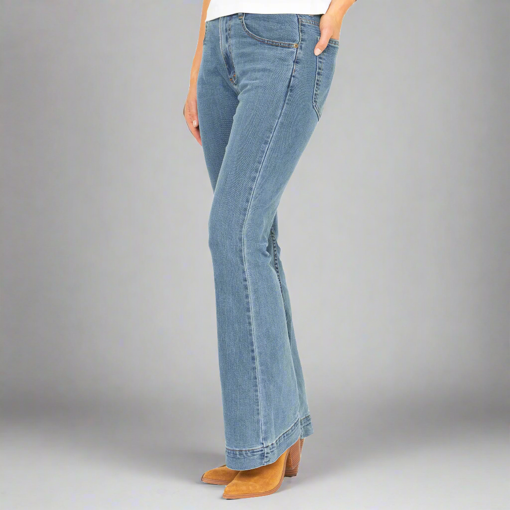 Detail of the Horween leather patch at the back waistband of the flare jeans.