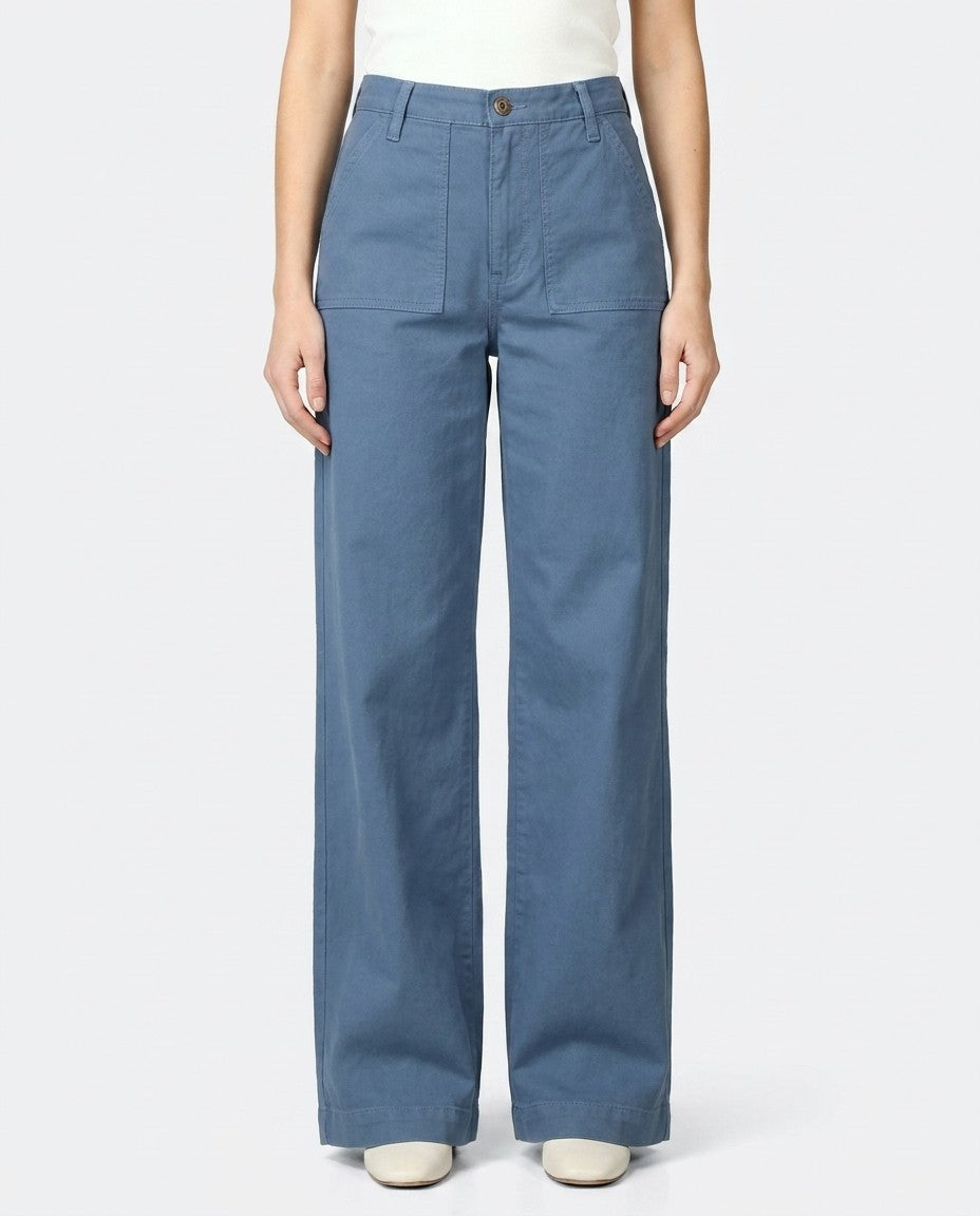 Back view of the blue Palazzo jeans showing the oversize back pockets and Horween leather patch.