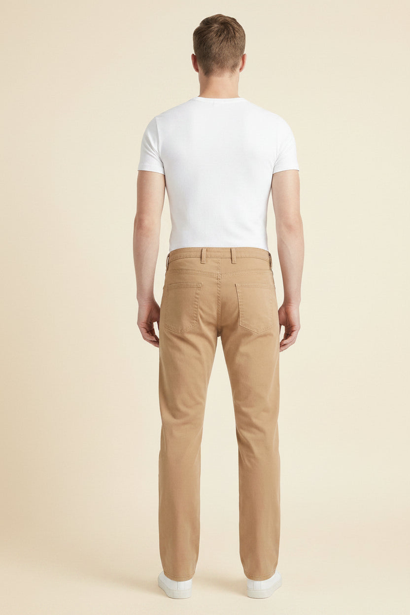 Back view of wheat wash Tailored Fit jeans with Horween leather patch at the waistband.