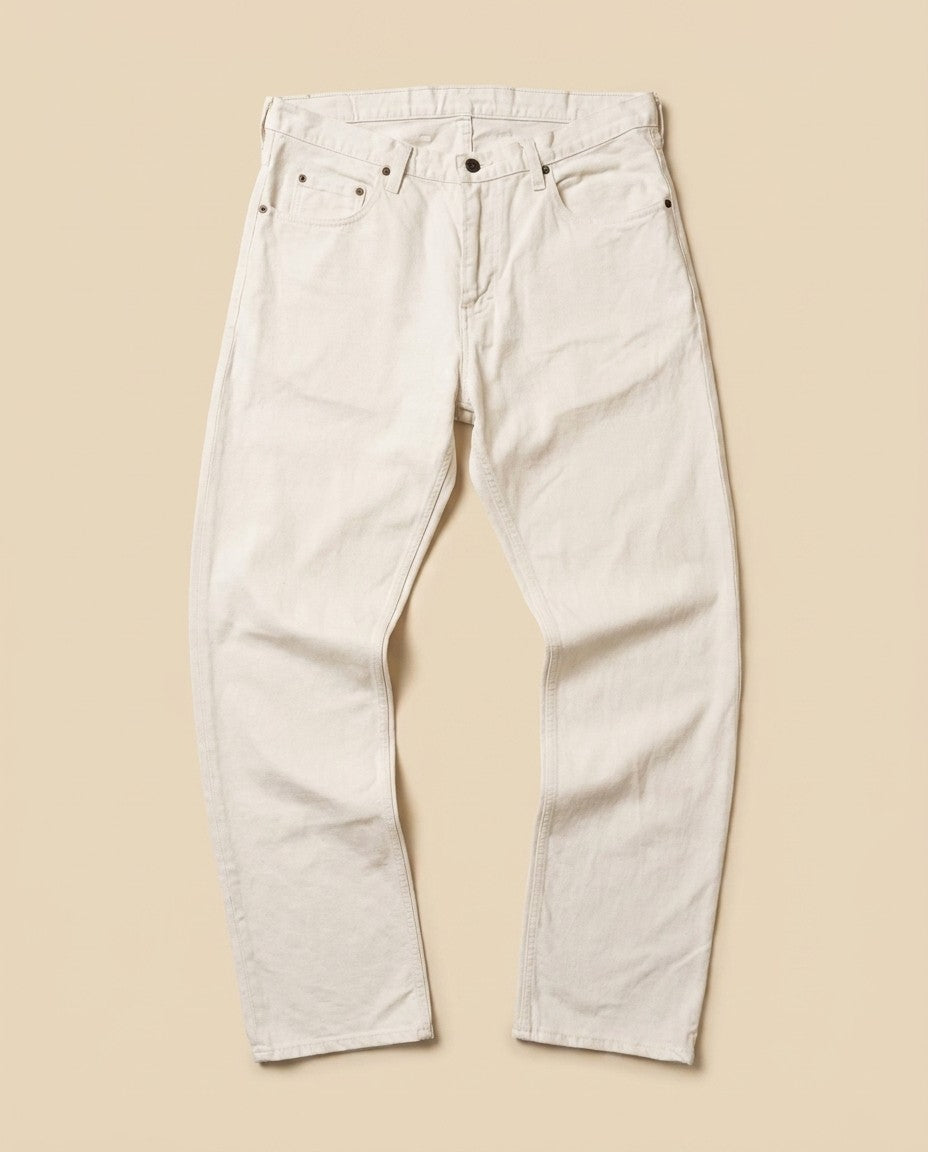 Back view of the Milk wash Tailored Fit jeans showing back pockets and Horween leather patch.