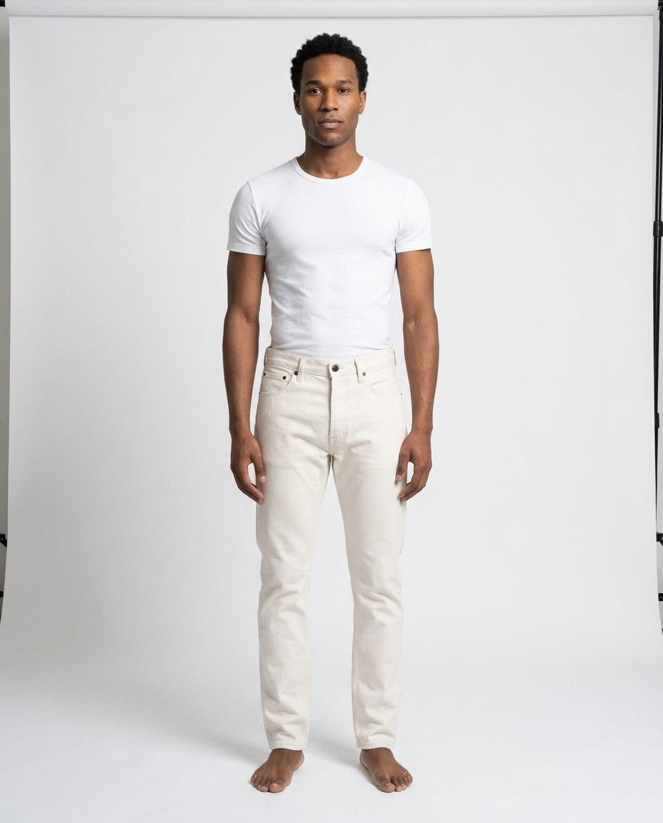 Tailored Fit men's jeans in the light Milk wash, shown flat from the front.