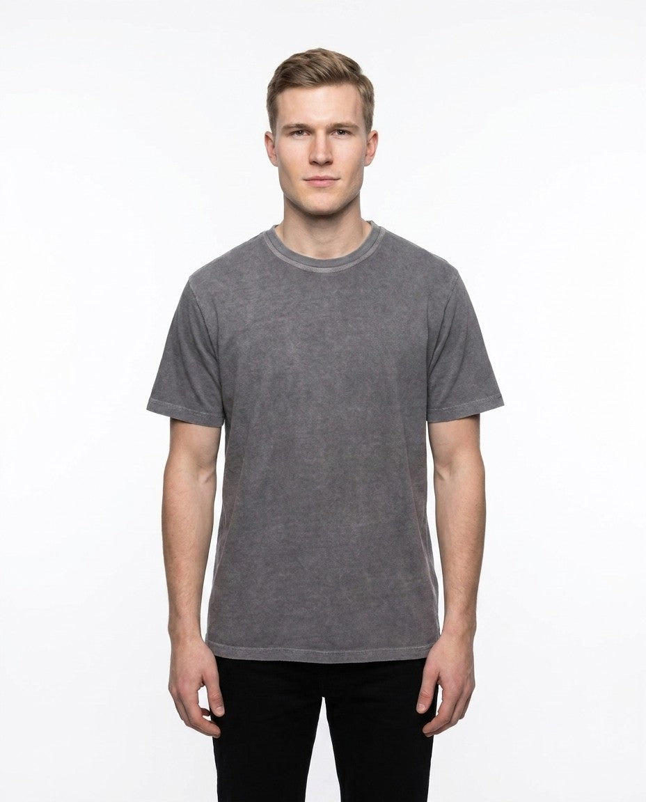 Close-up of the fine gauge interlock knit fabric and stitched collar on the Flint T101 tee.