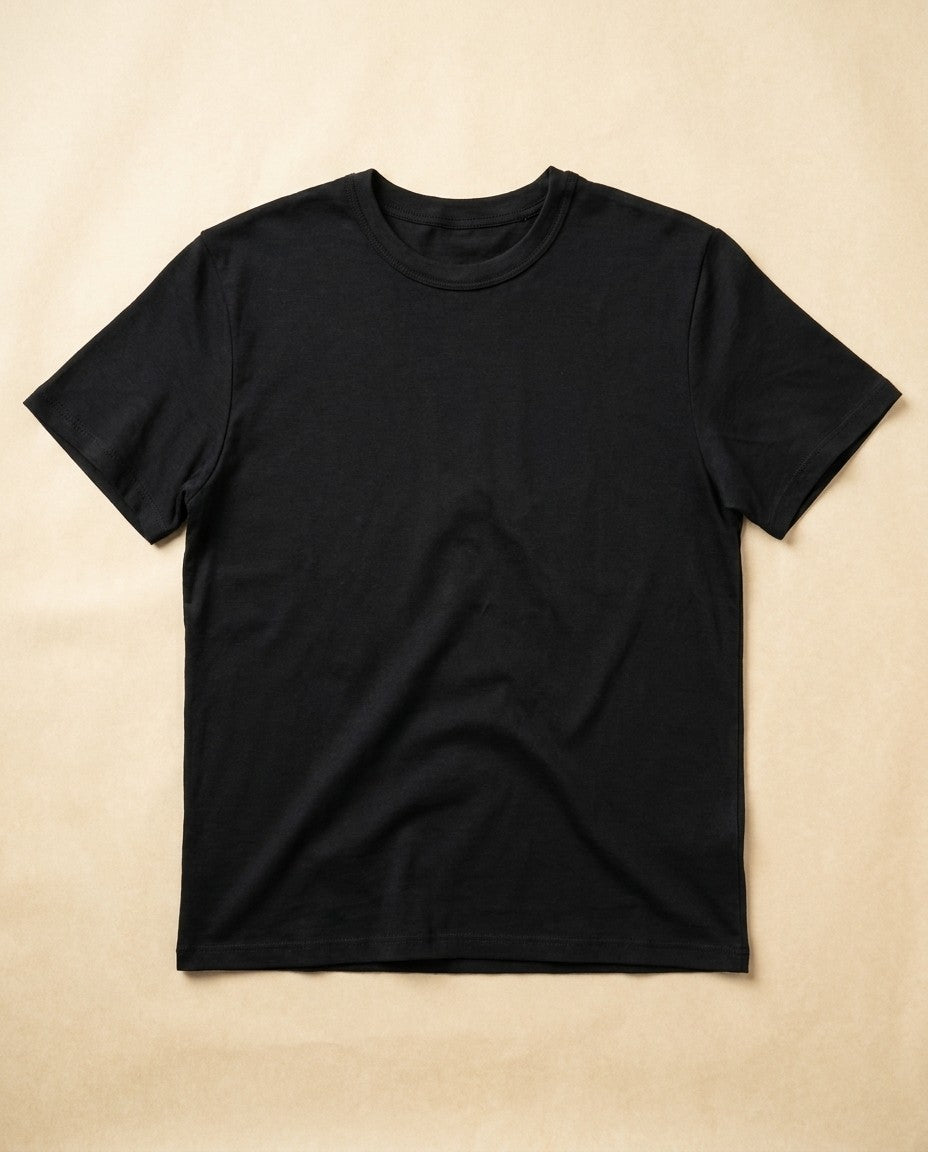 Black Supima cotton t-shirt laid flat, front view, showing crew neck and short sleeves.