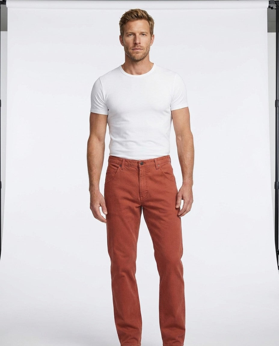 Side view of Straight 19 jeans in Red Ochre, showing fit through the seat and thigh.