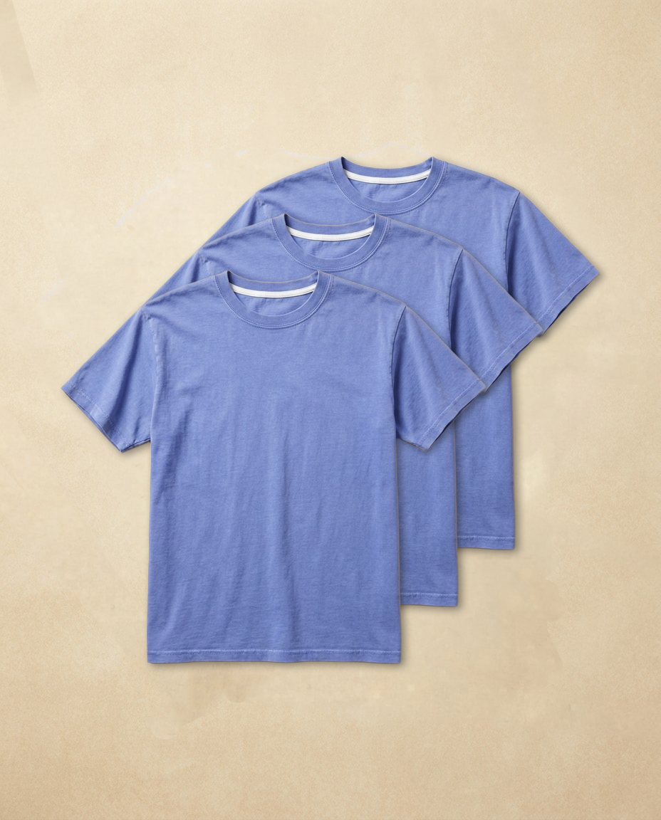 Sky blue combed cotton T101 t-shirt laid flat, showing the crew neck and mid bicep sleeves.