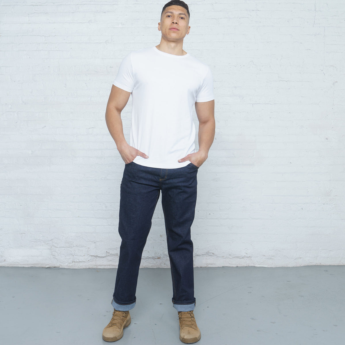 Back view of dark wash relaxed fit jeans showing back pockets