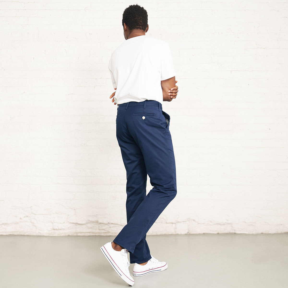 Front pocket detail on the navy stretch chino.