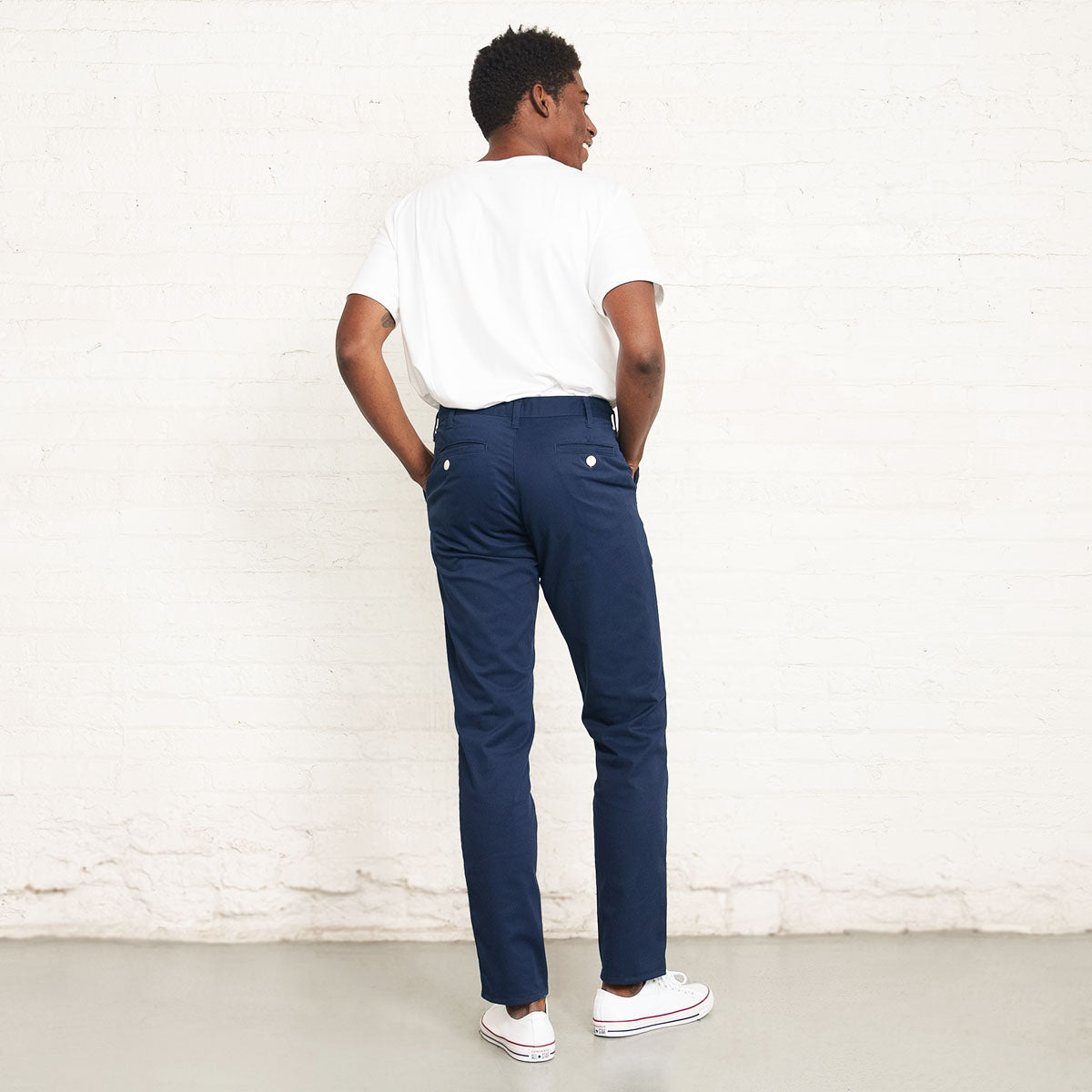 Navy stretch chino shown with the other colors in the range.