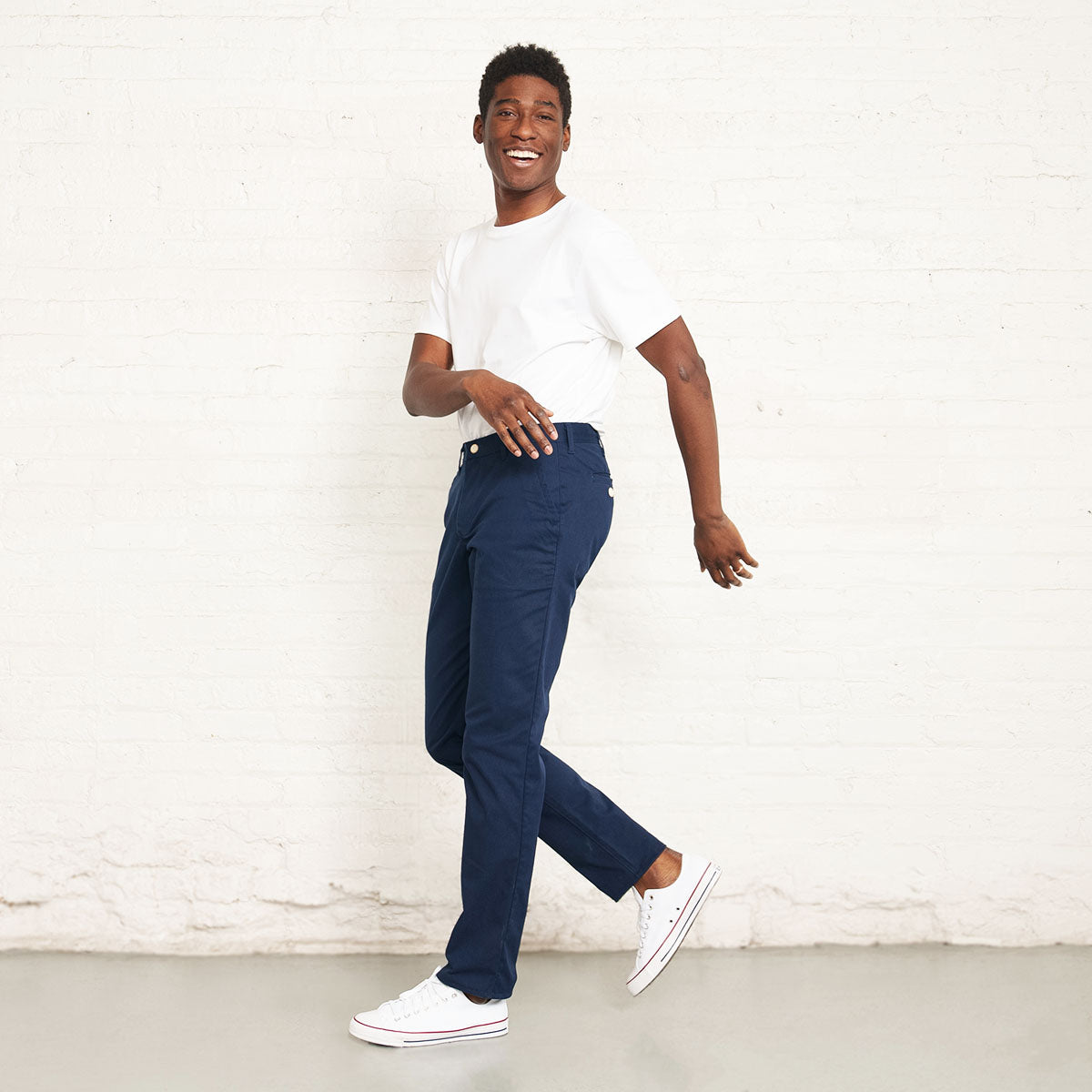 Tapered lower leg and 14.5 inch leg opening of the navy chino.