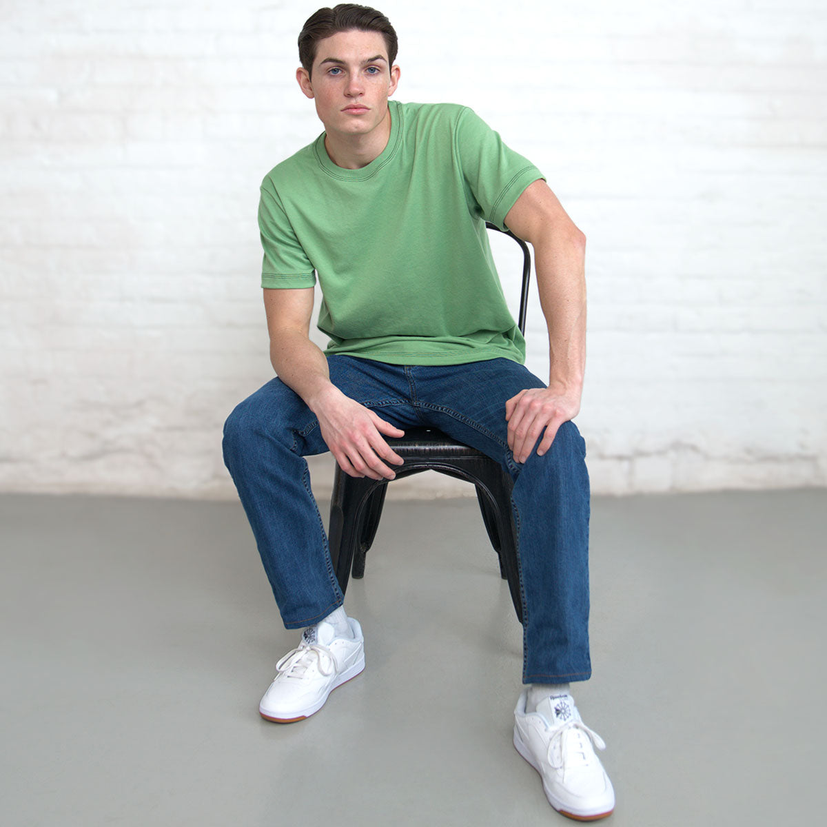Detail of the fitted crew neck collar on the jade Supima t-shirt