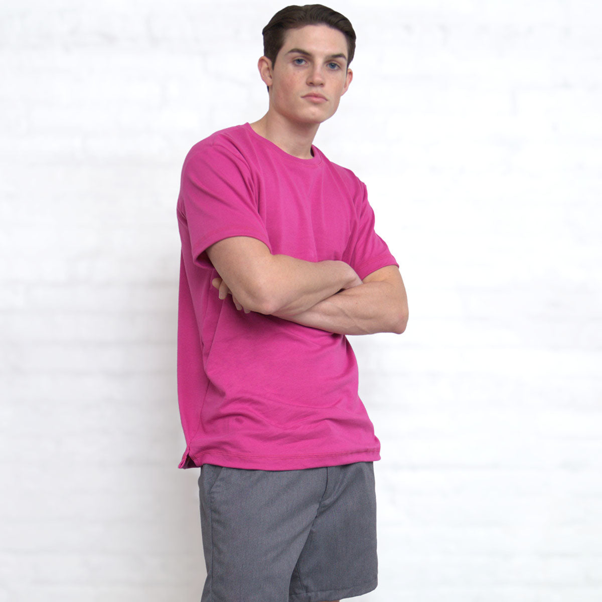 Close-up of the fine gauge interlock knit fabric in magenta