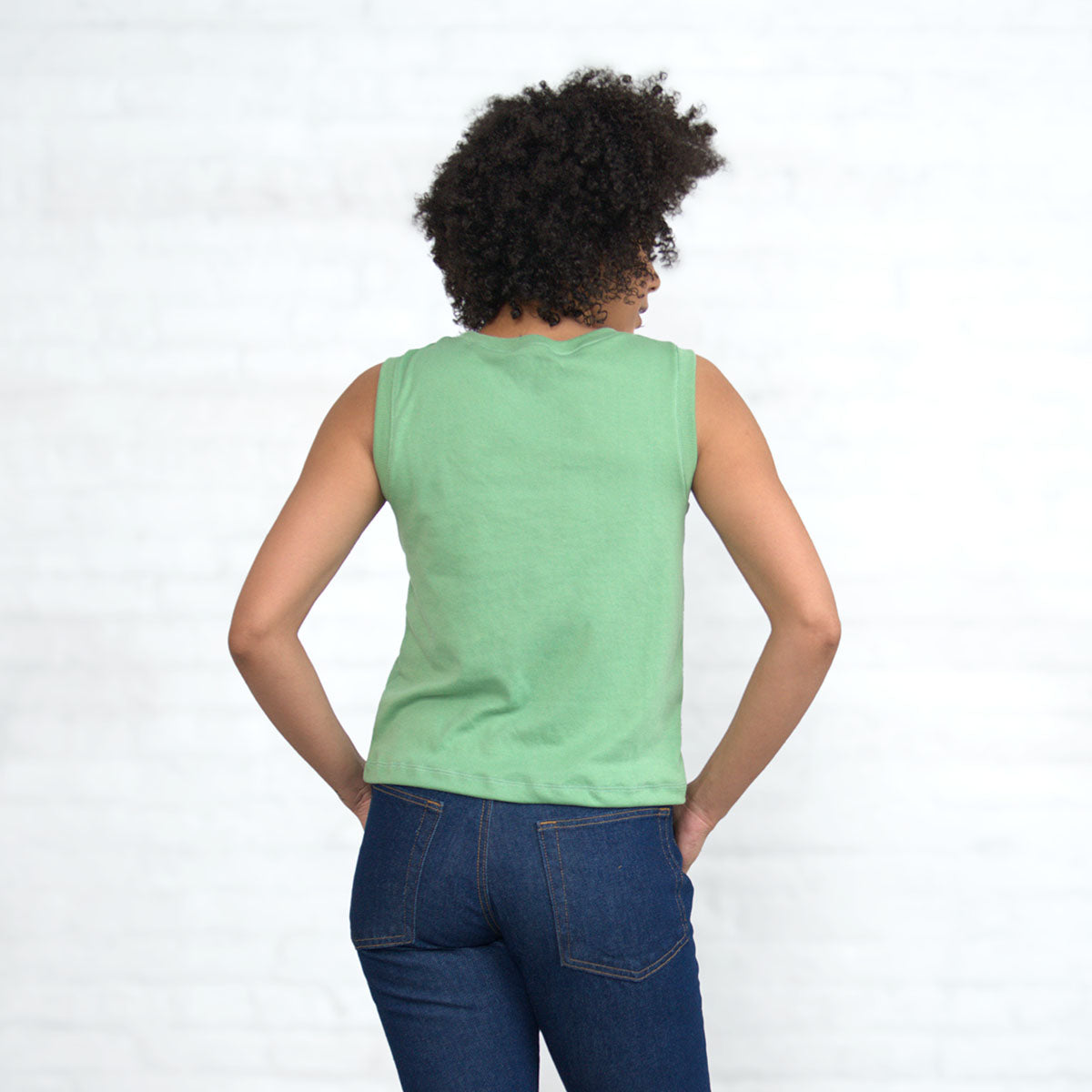 Close-up of the fine gauge interlock knit in jade green