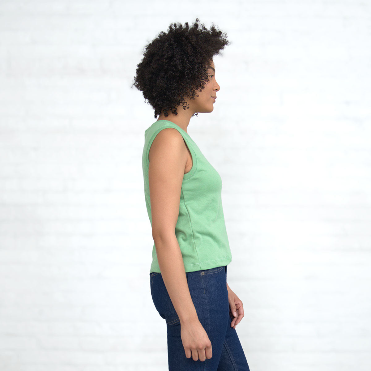 Side view of the jade Supima cotton crop tank