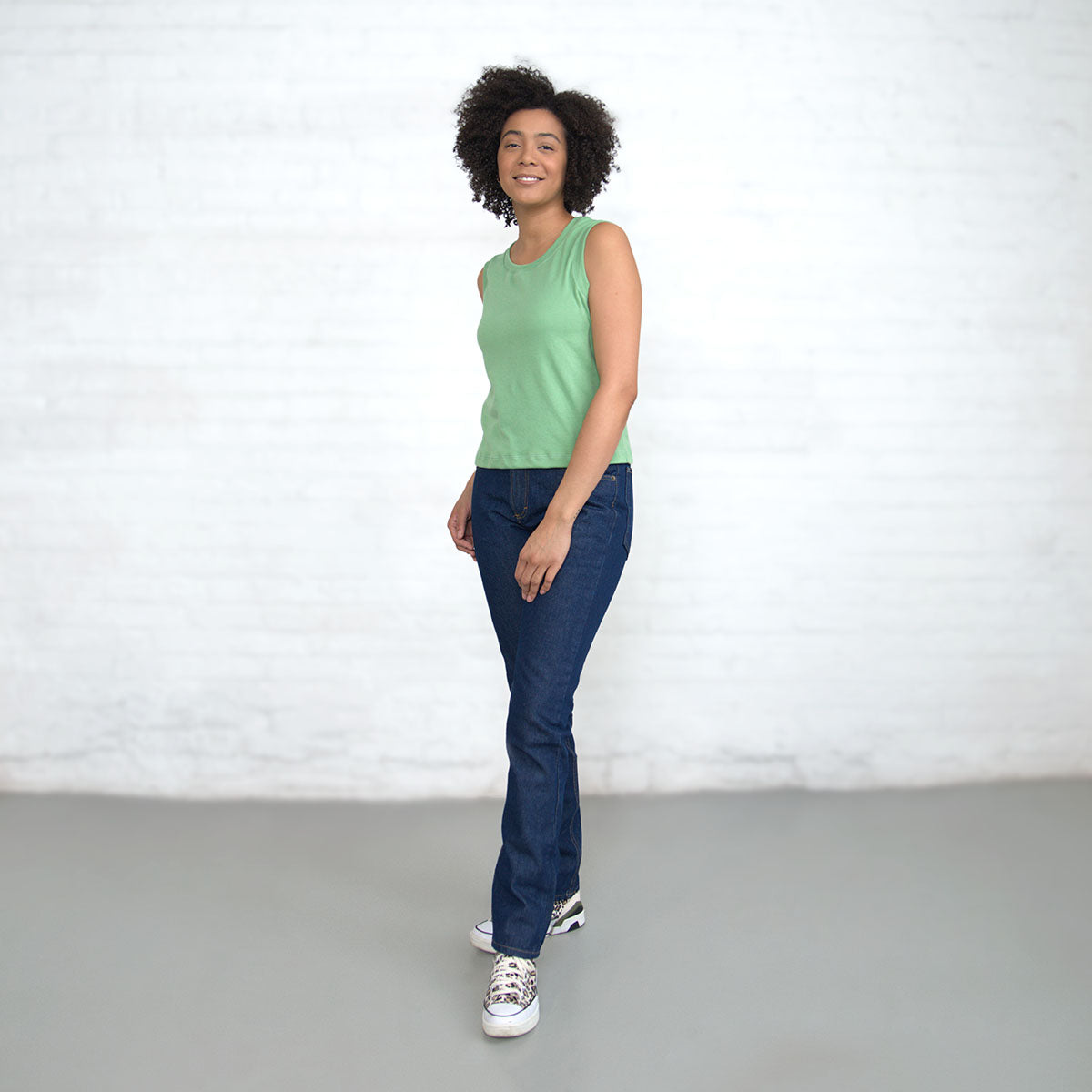 Cropped hem detail on the jade Supima cotton tank