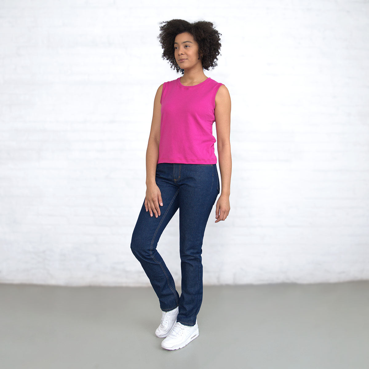 Cropped hem detail on the magenta Supima cotton top