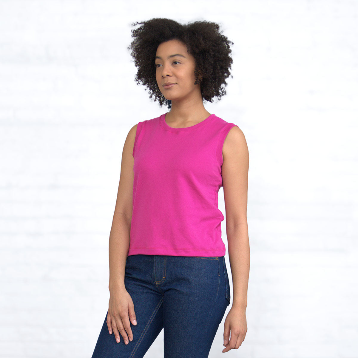 Back view of the magenta sleeveless crop top