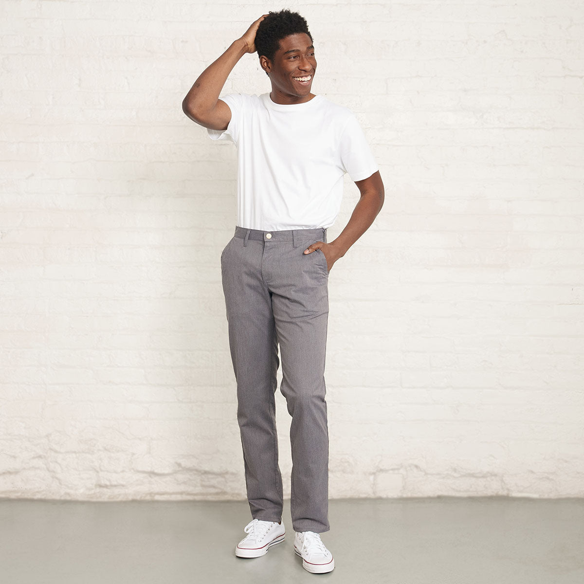 Grey stretch chino folded to show color and twill texture