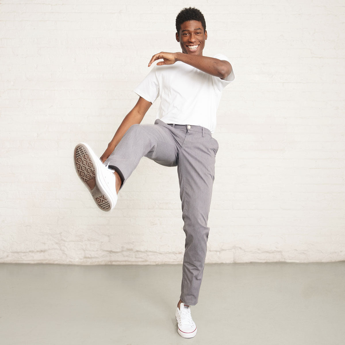Side view of grey stretch chino on a model