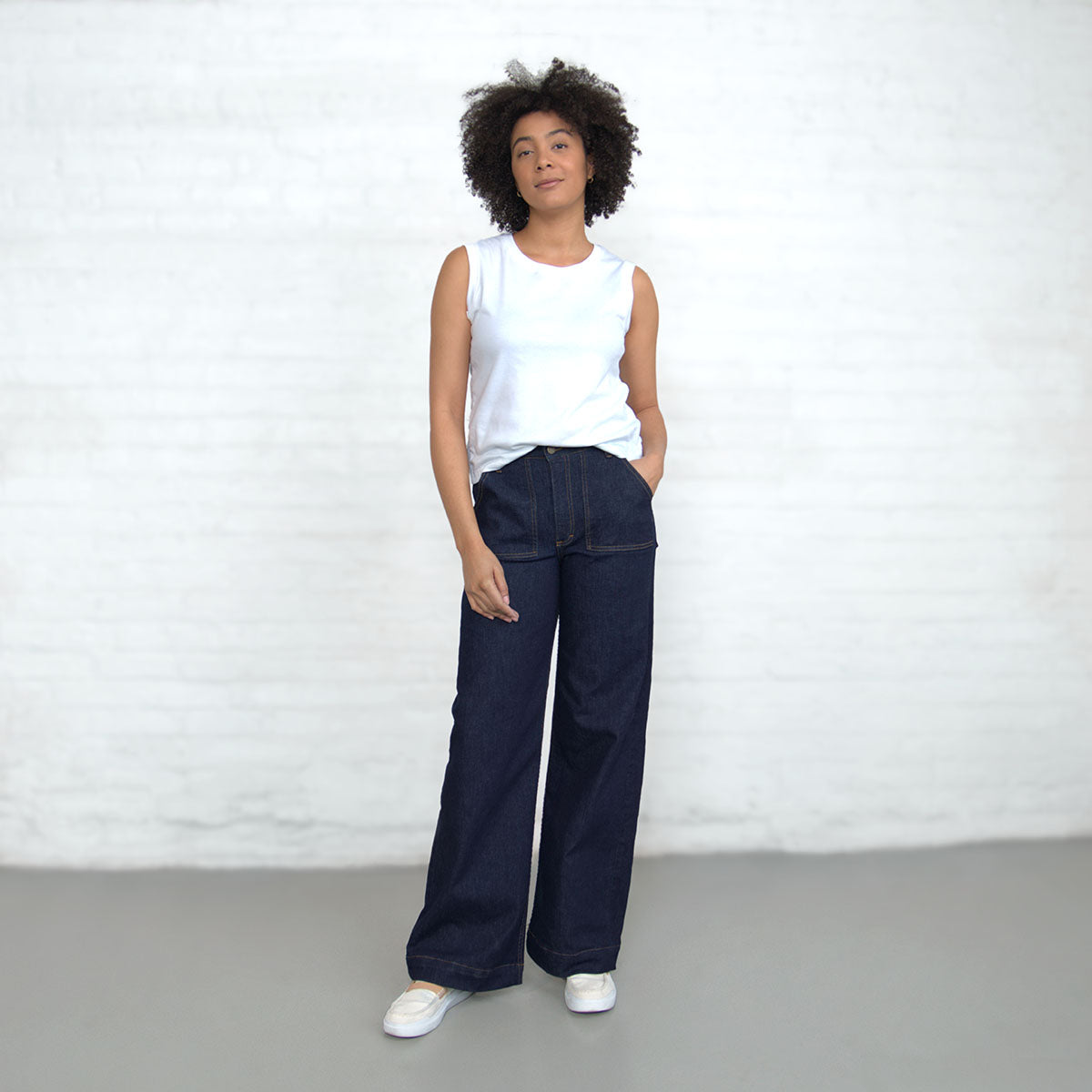 Side view of high-rise wide-leg dark wash denim jeans