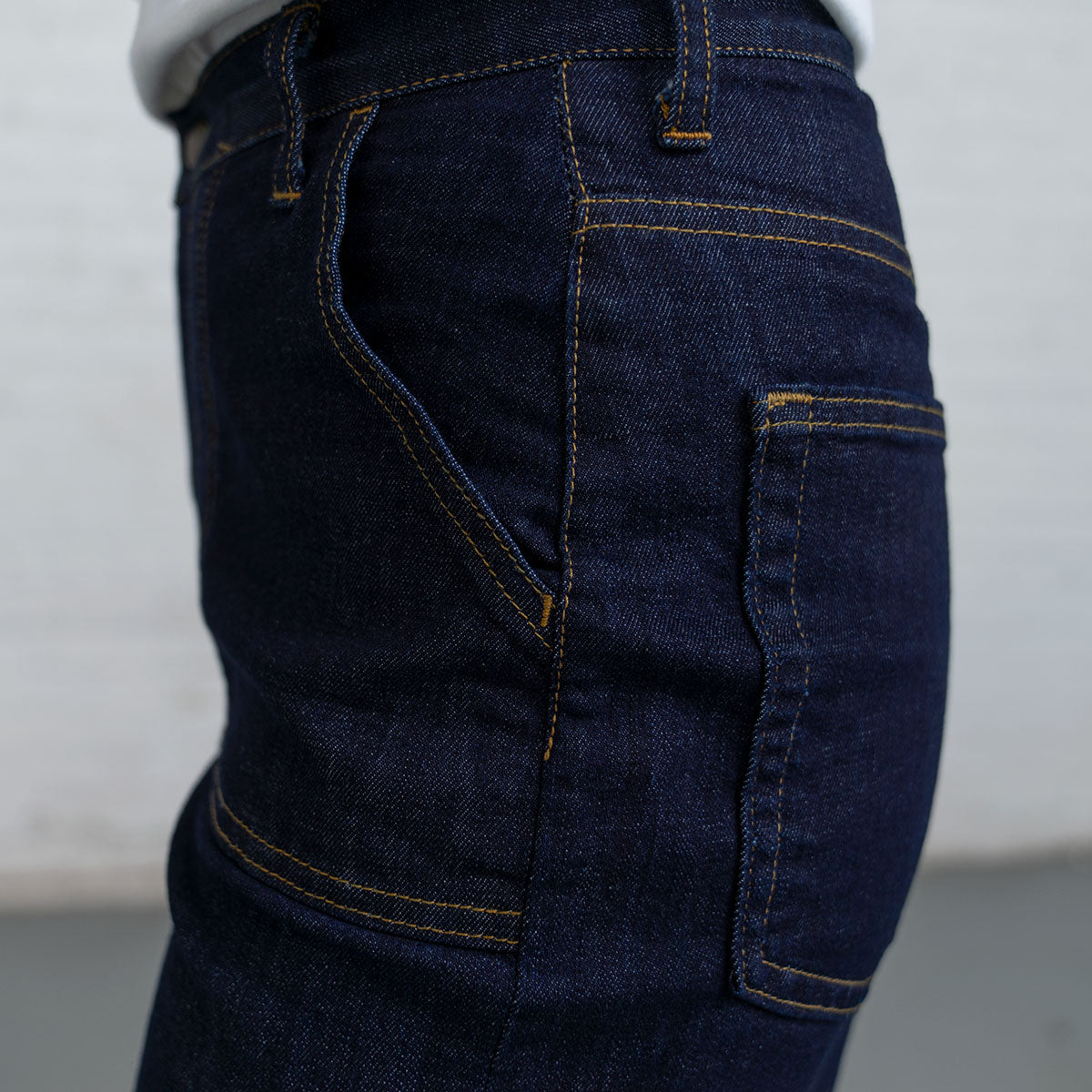 Detail of the dark wash denim fabric weave