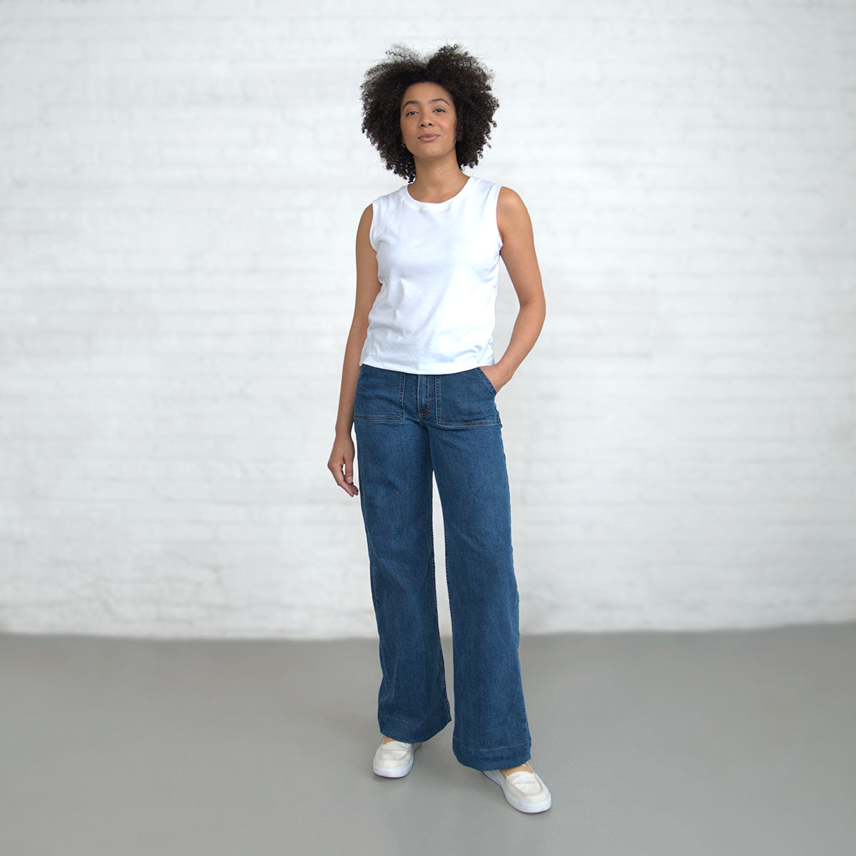 Light wash high-rise wide-leg Palazzo jeans shown from the front