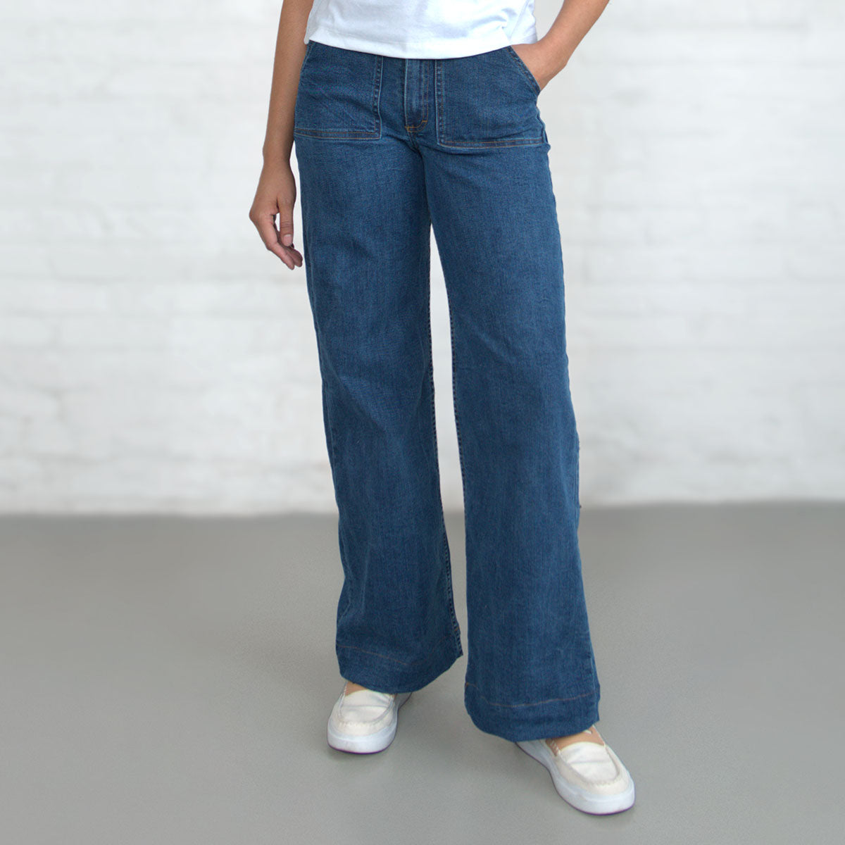 Full-length front view of the wide-leg jeans worn with shoes