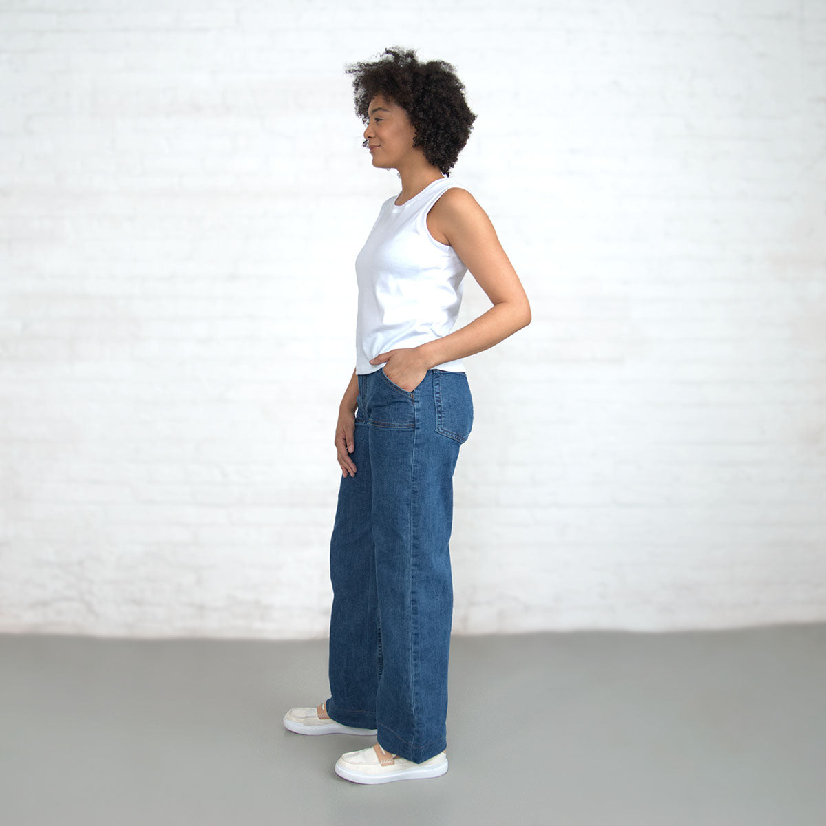 Close-up of the patch front pocket on light wash stretch denim