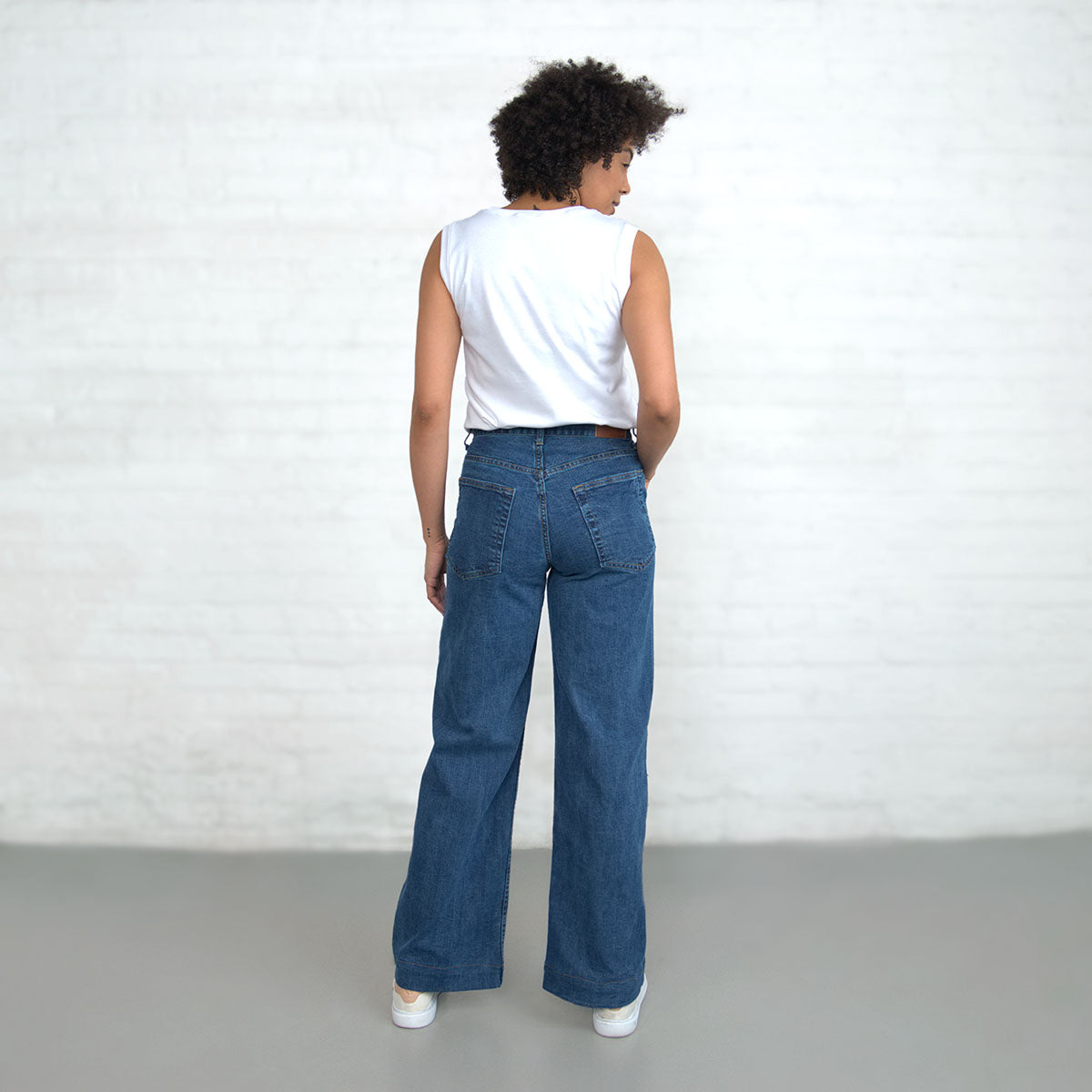 Side view of the Palazzo wide-leg jeans in light wash stretch denim
