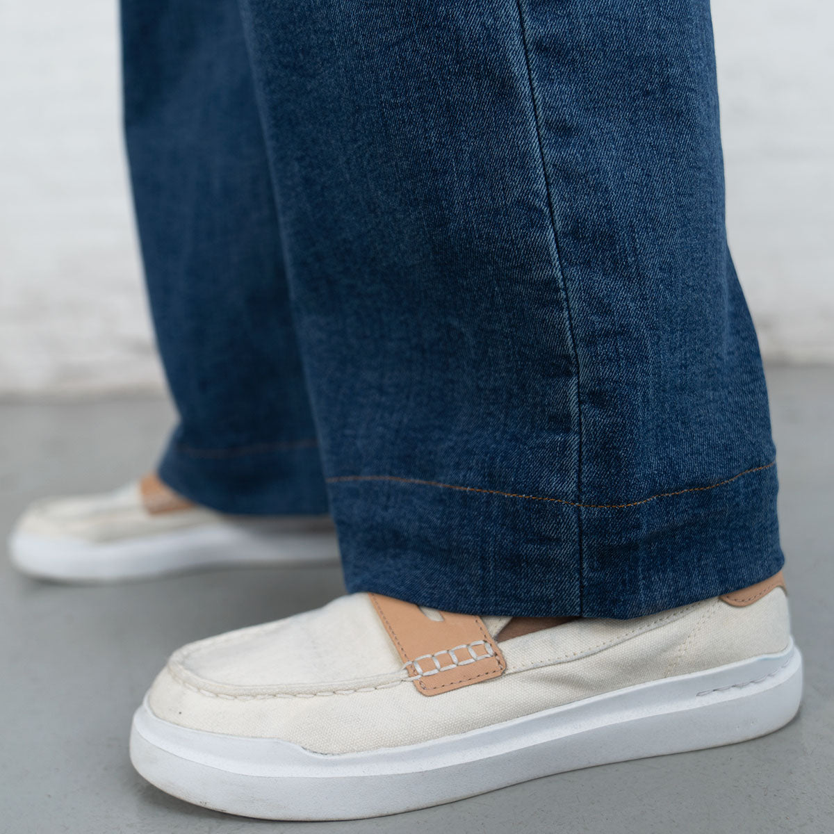 Close-up of the 2-inch hem at the bottom of the wide leg