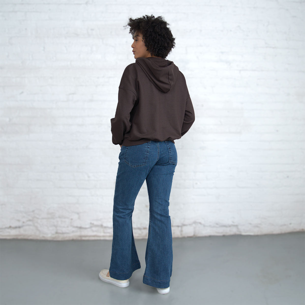 Full-length view of the Slouch Sweatshirt worn with jeans.